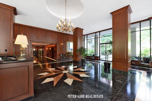 220 East 65th Street, Unit 8J Manhattan, NY 10065 - Photo 18 of 23 a view of a room with gym equipment