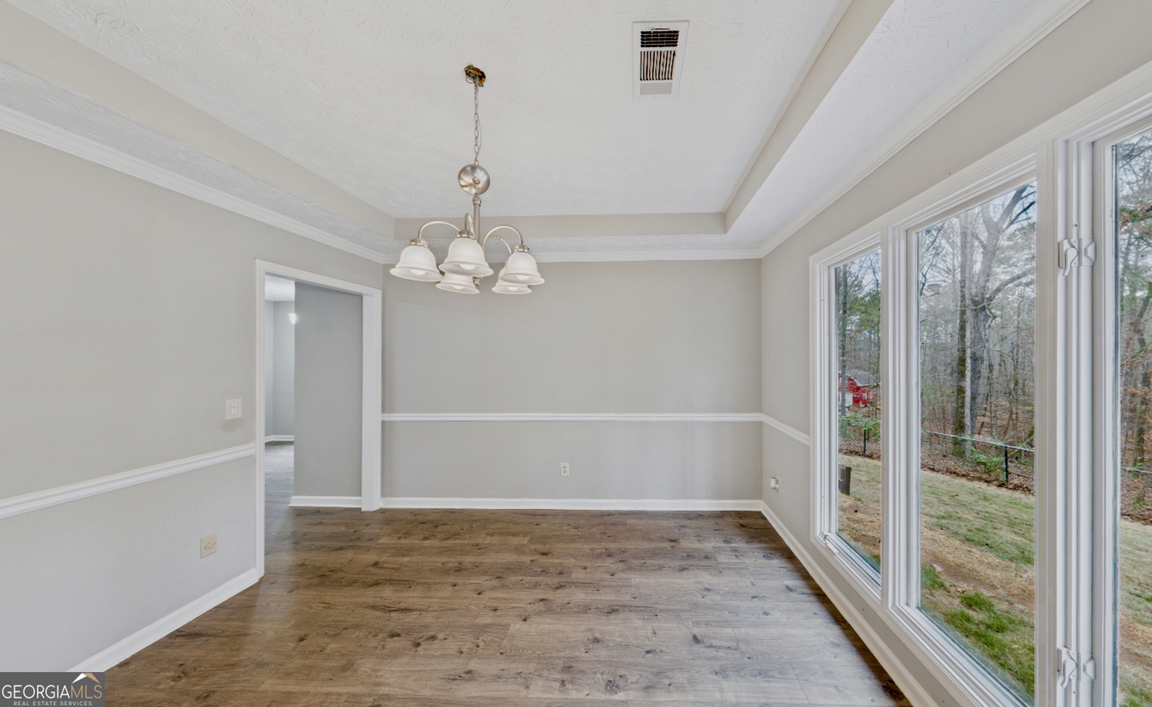 292 Blue Bird Trail Fortson, GA 31808 - Photo 16 of 45 a view of an empty room with a window