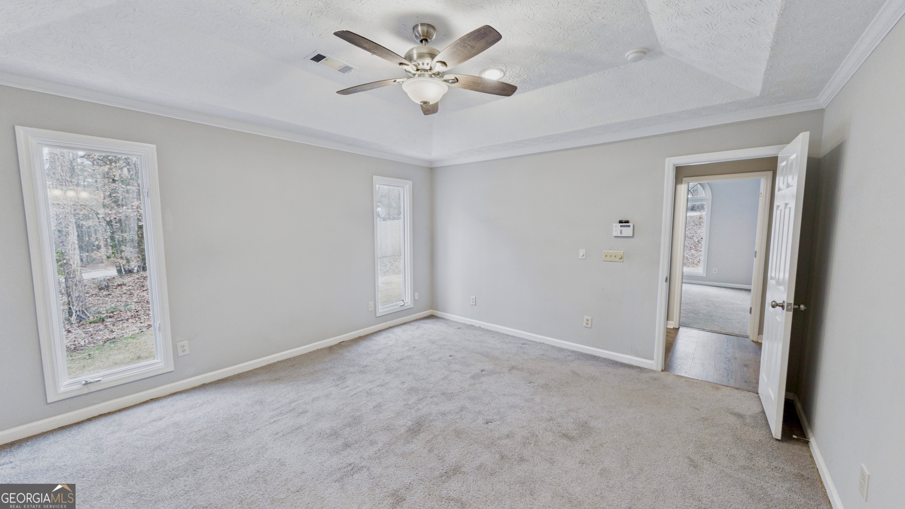 292 Blue Bird Trail Fortson, GA 31808 - Photo 18 of 45 a view of an empty room with a window