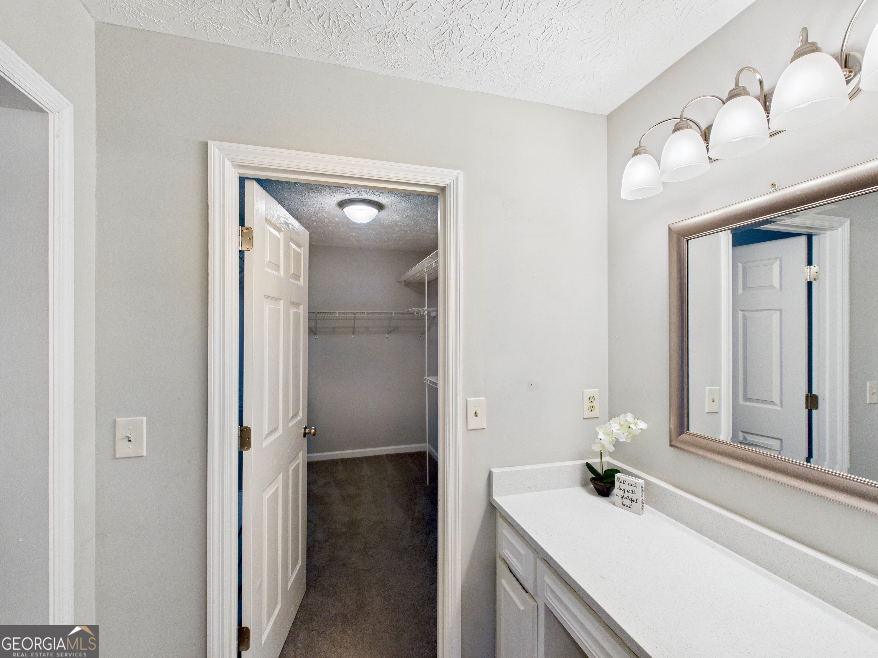 292 Blue Bird Trail Fortson, GA 31808 - Photo 20 of 45 a bathroom with a sink and a mirror