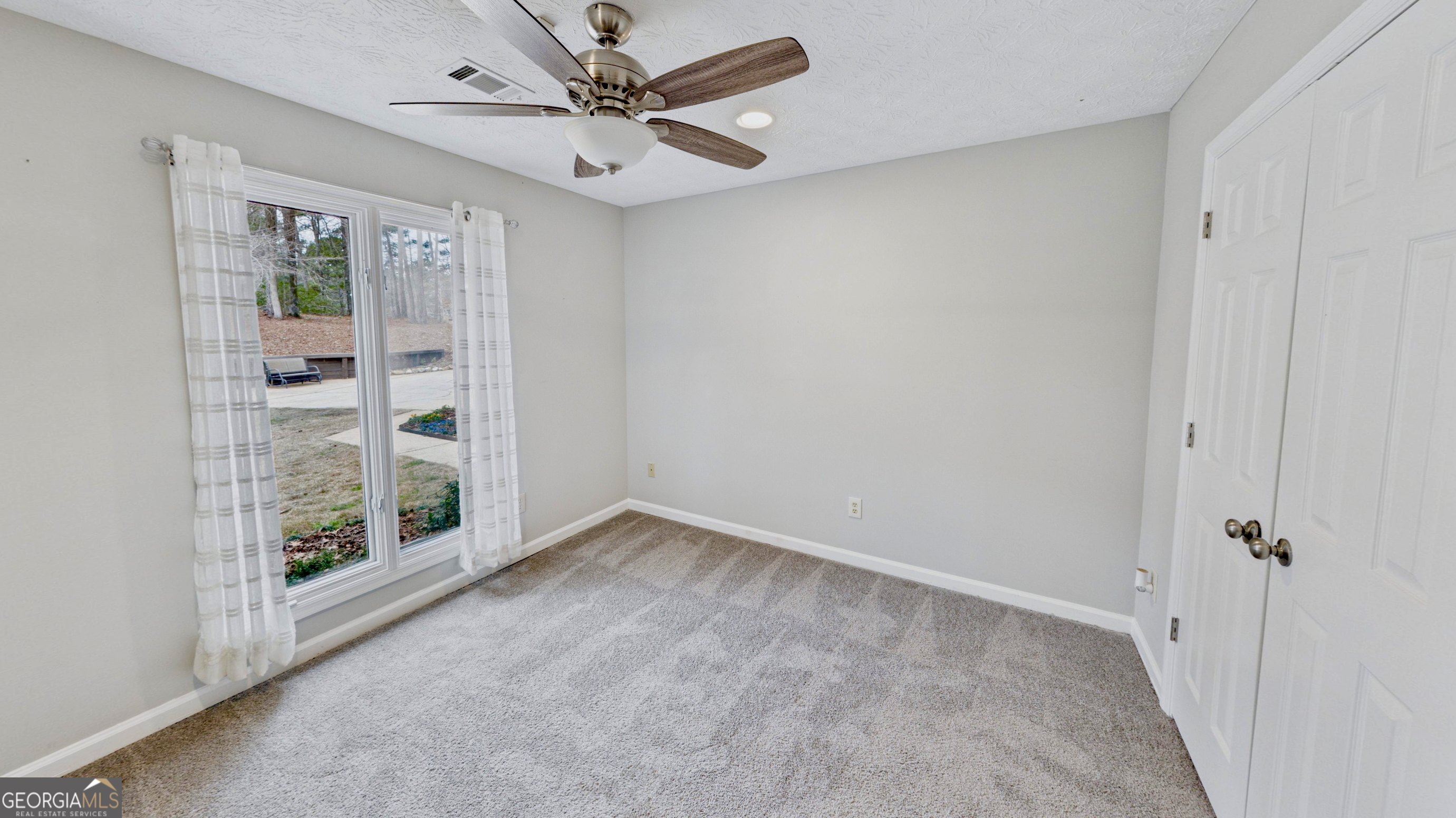 292 Blue Bird Trail Fortson, GA 31808 - Photo 26 of 45 a view of an empty room with a window