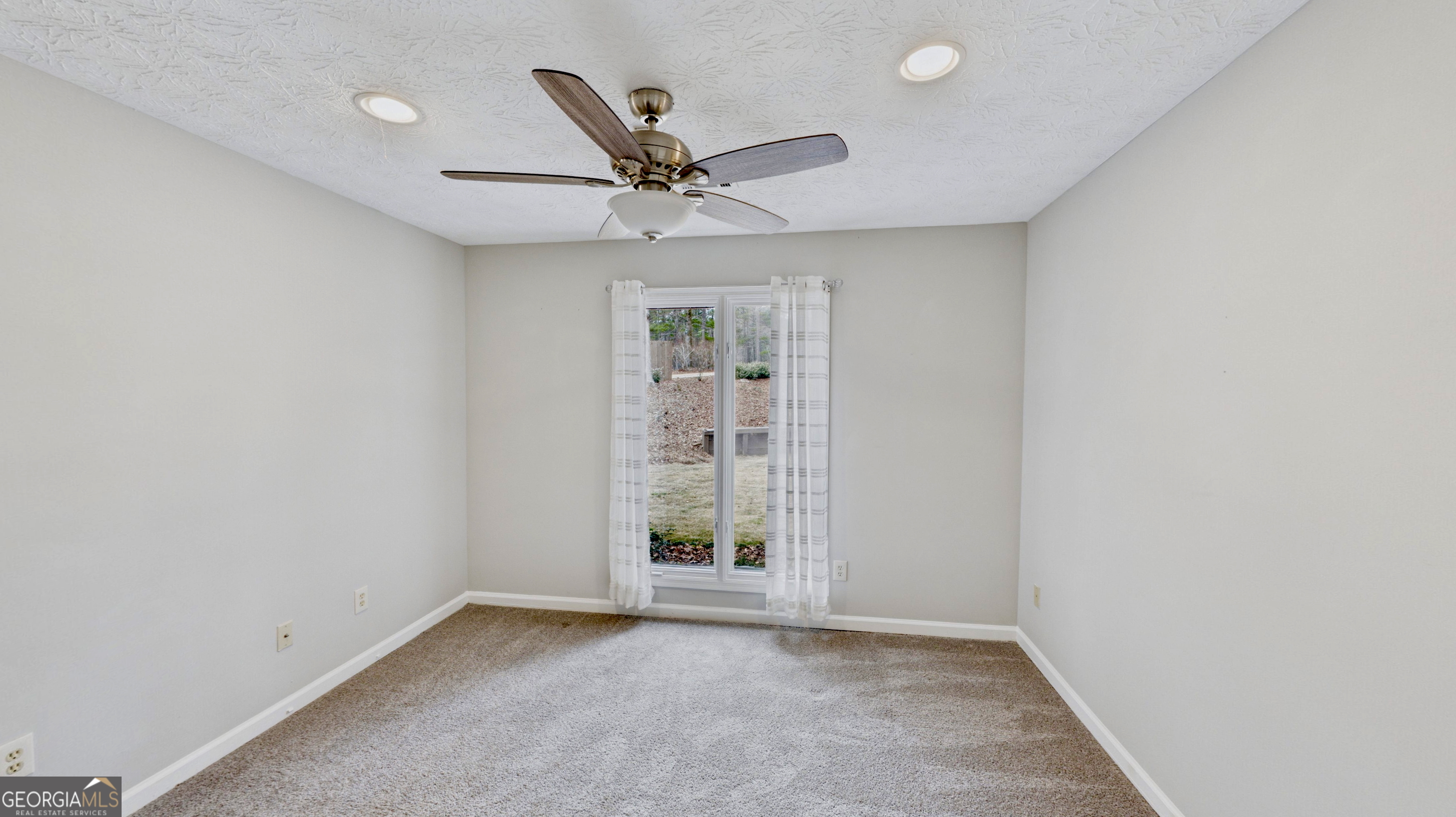 292 Blue Bird Trail Fortson, GA 31808 - Photo 28 of 45 an empty room with windows