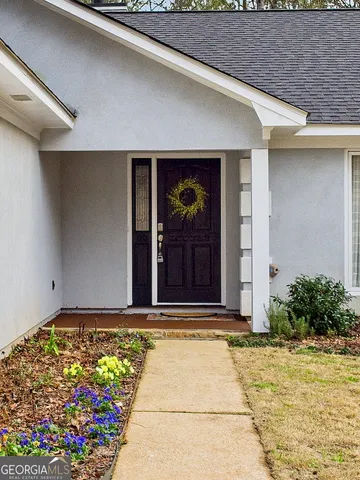 a view of house with an outdoor space