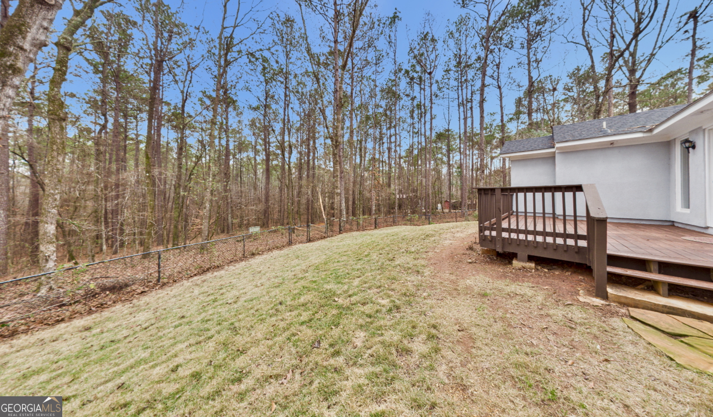292 Blue Bird Trail Fortson, GA 31808 - Photo 36 of 45 a view of backyard with wooden fence