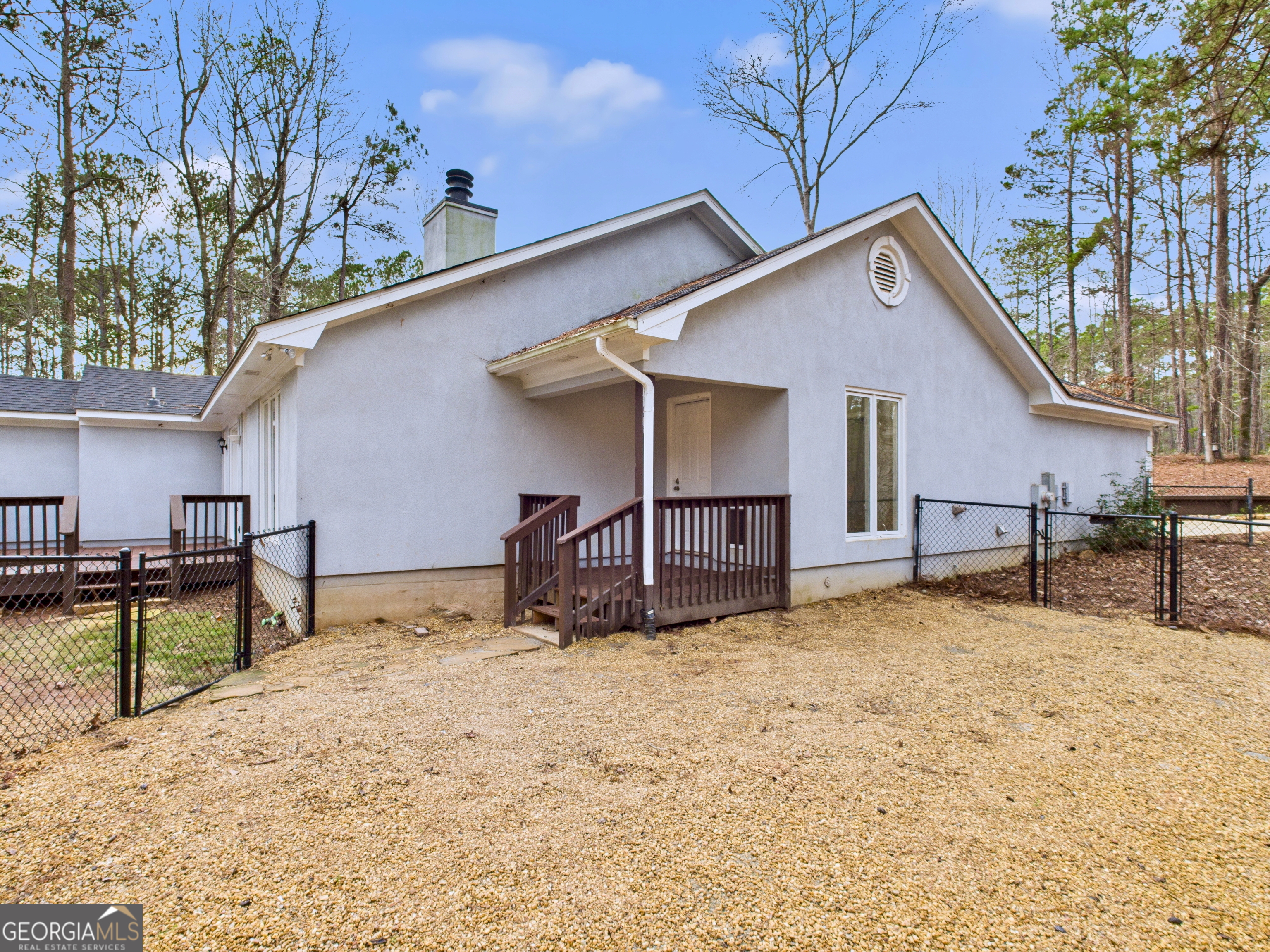 292 Blue Bird Trail Fortson, GA 31808 - Photo 38 of 45 a view of a house with a yard and covered with snow in front of house