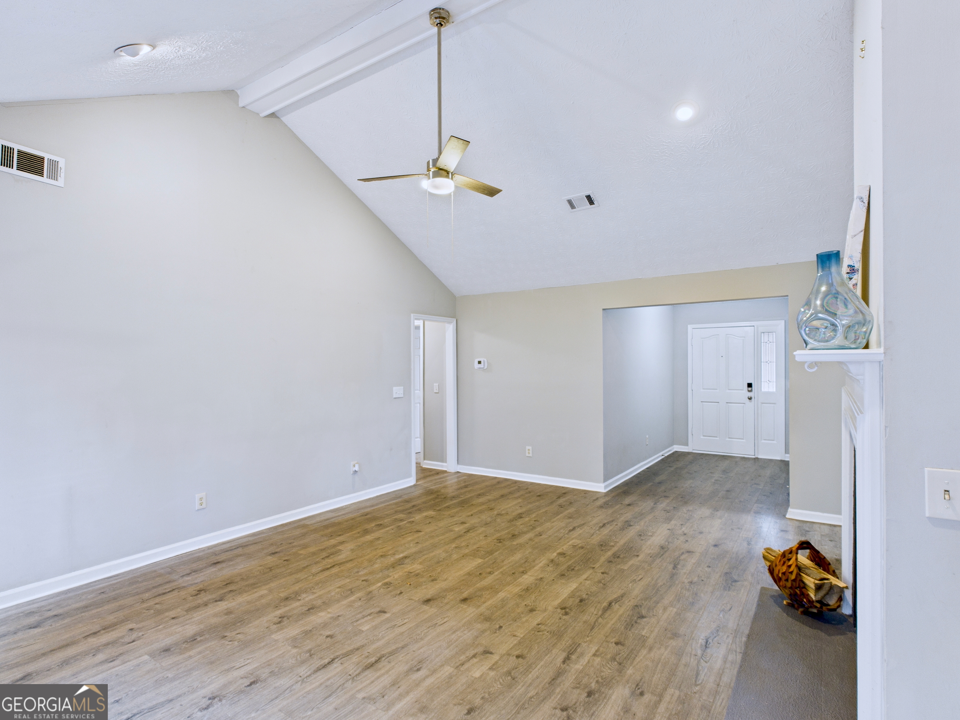 292 Blue Bird Trail Fortson, GA 31808 - Photo 7 of 45 a view of empty room with wooden floor