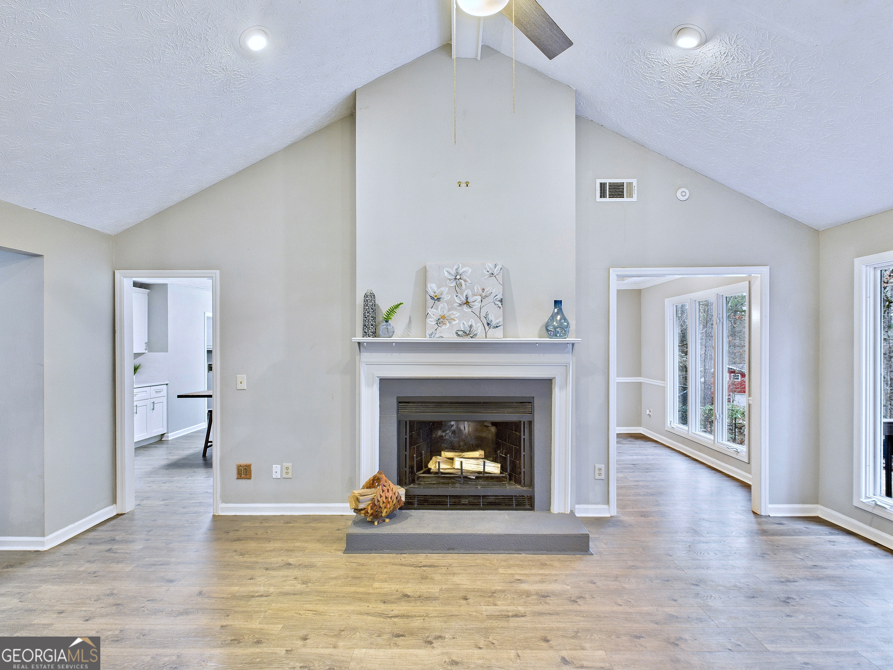 292 Blue Bird Trail Fortson, GA 31808 - Photo 8 of 45 a living room with furniture and a fireplace