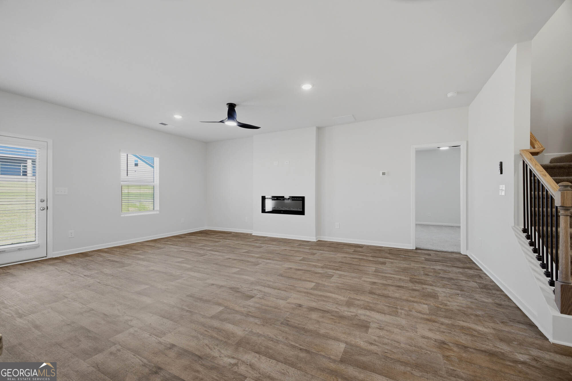 309 Rusty Plow Lane Perry, GA 31069 - Photo 25 of 34 a view of empty room with wooden floor