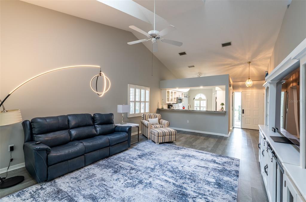747 Inverie Drive Inverness, FL 34453 - Photo 15 of 40 a living room with furniture and a flat screen tv