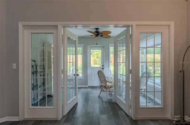 a view of a livingroom with furniture and windows