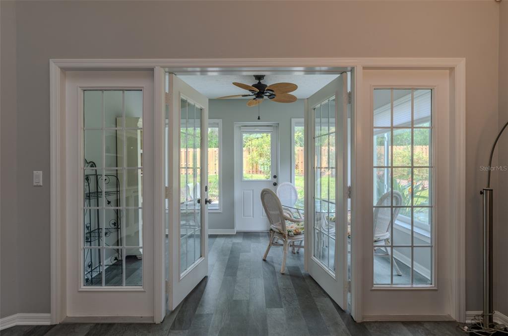 747 Inverie Drive Inverness, FL 34453 - Photo 17 of 40 a view of a livingroom with furniture and windows