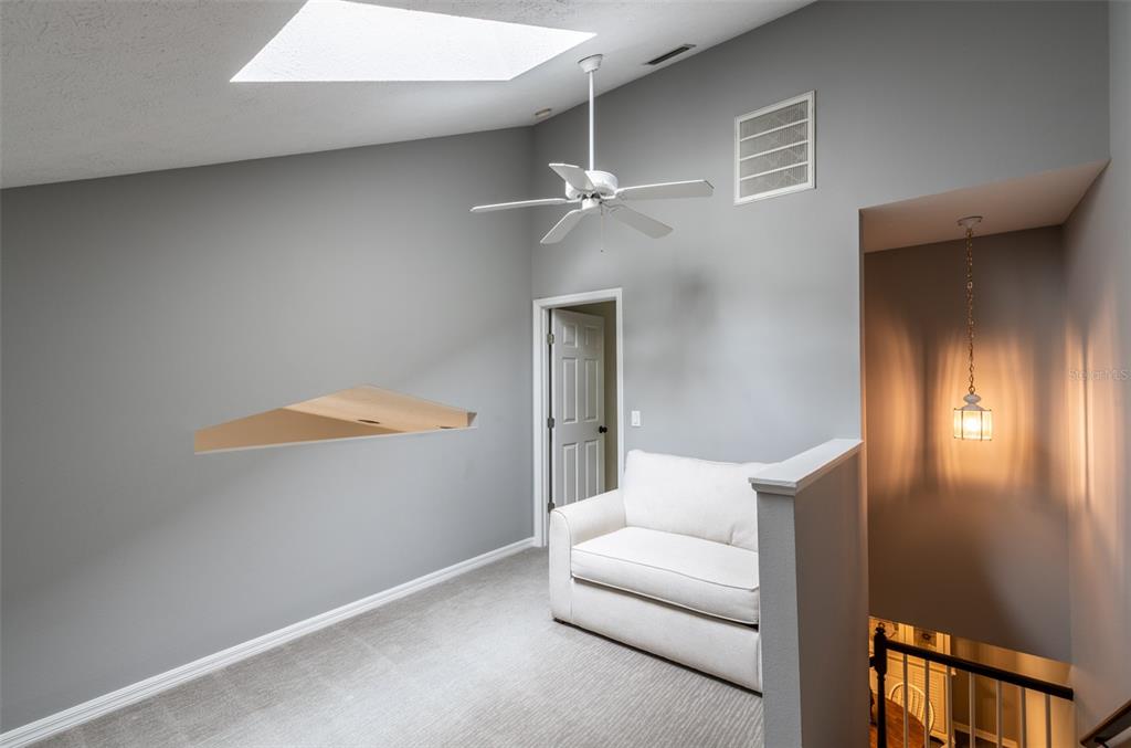 747 Inverie Drive Inverness, FL 34453 - Photo 31 of 40 a living room with furniture and a window