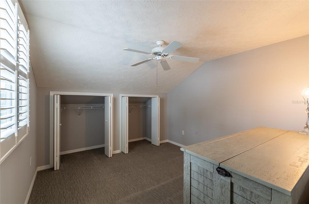 747 Inverie Drive Inverness, FL 34453 - Photo 34 of 40 an empty room with closet and windows