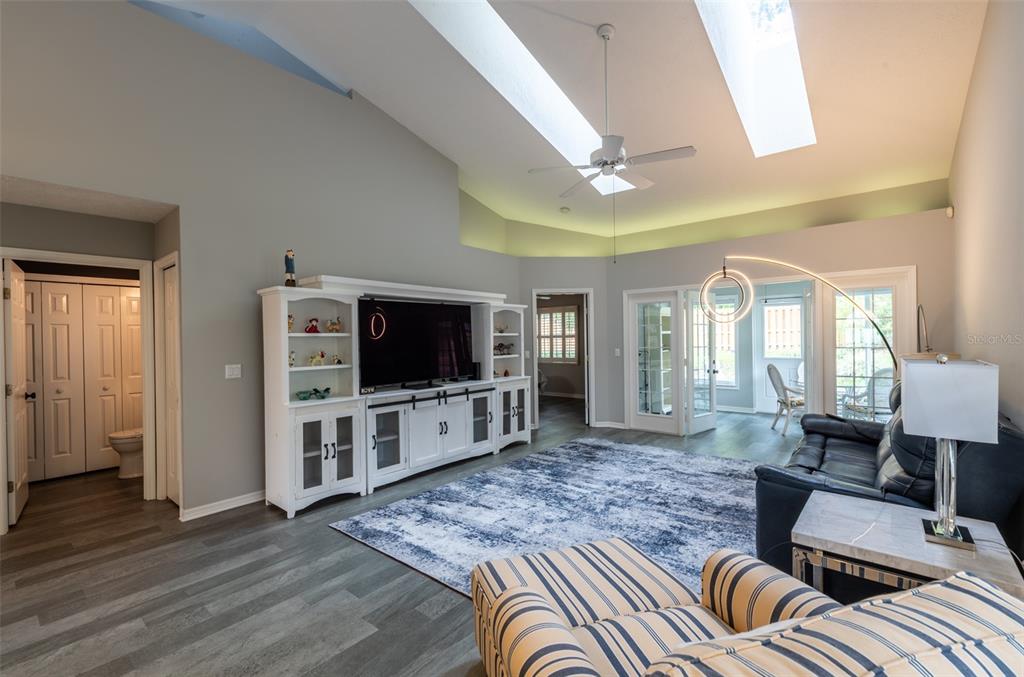747 Inverie Drive Inverness, FL 34453 - Photo 5 of 40 a living room with furniture and a flat screen tv