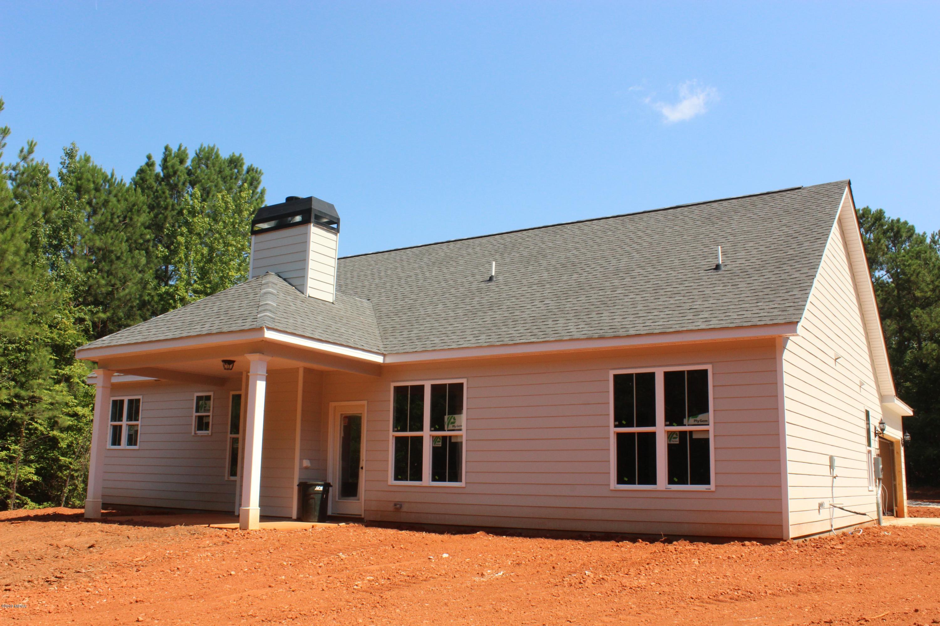 2748 Boxankle Road Forsyth, GA 31029 - Photo 6 of 6 a front view of a house with a yard