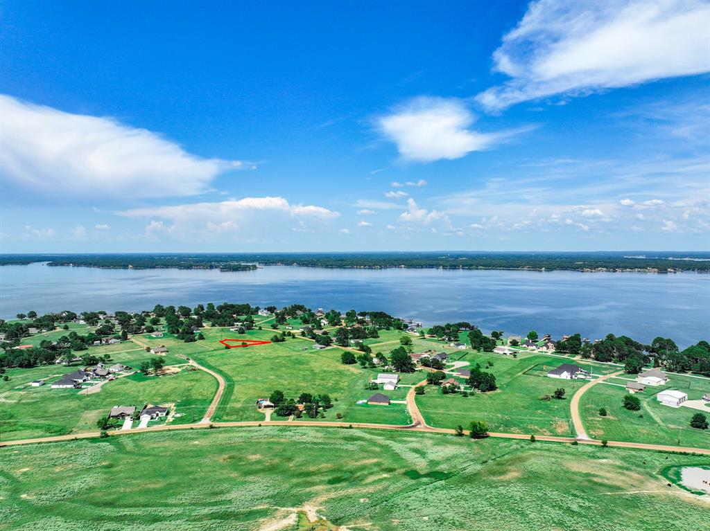 Tbh1 Lazy Cane Ranch Road Trinidad, TX 75163 - Photo 1 of 8 a view of a golf course with a big yard