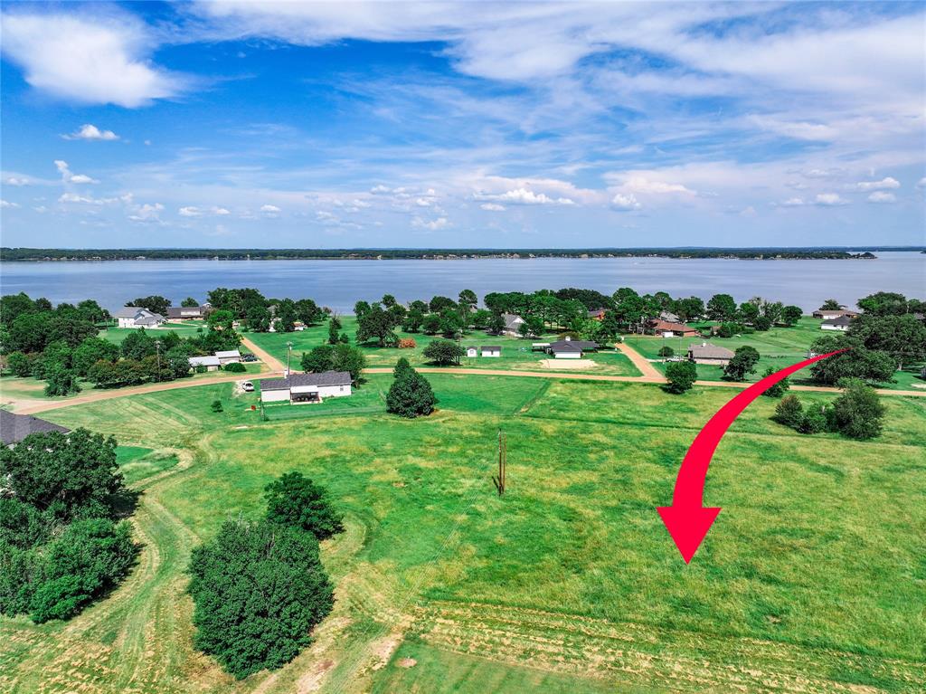 Tbh1 Lazy Cane Ranch Road Trinidad, TX 75163 - Photo 3 of 8 a view of a golf course with an ocean
