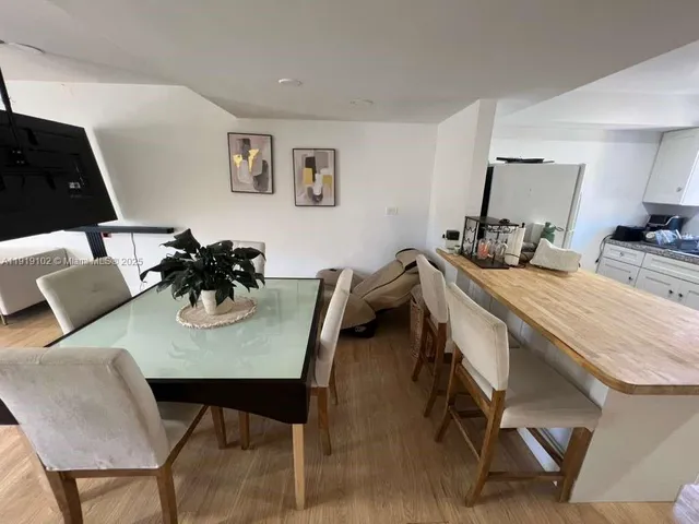 a view of a dining room and livingroom