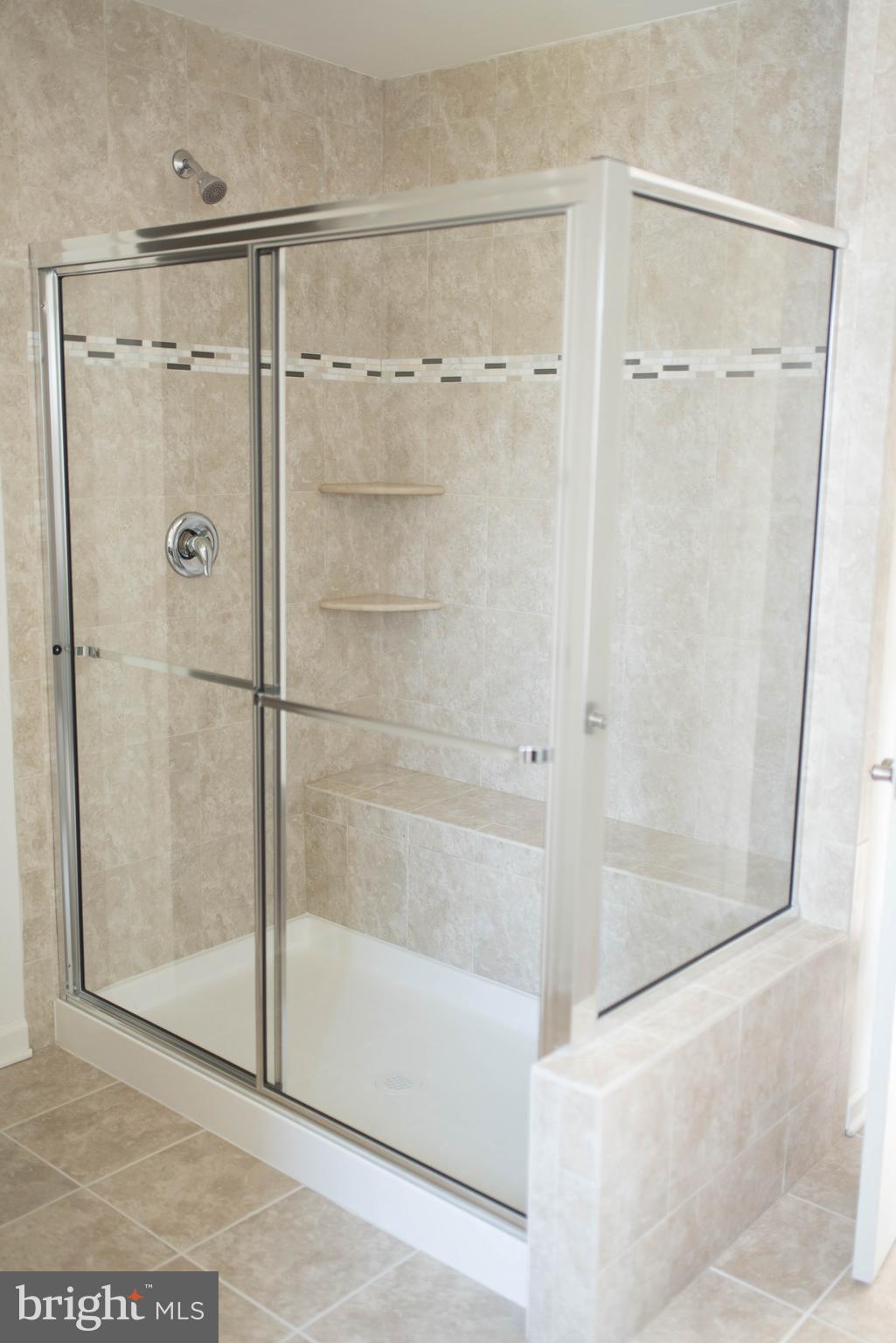 976 Morgan Run Road Middle River, MD 21220 - Photo 5 of 6 a bathroom with a glass shower door