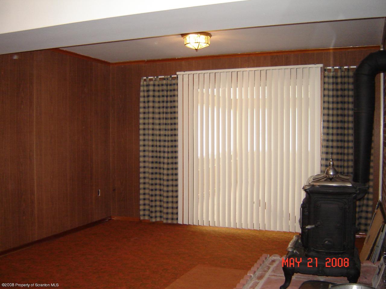 2343 T Rte 720 Moscow, PA 18444 - Photo 12 of 16 a view of a room with furniture and a window