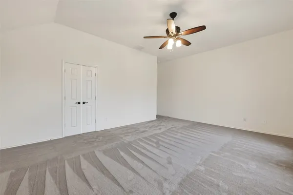 a bathroom with a tub and shower