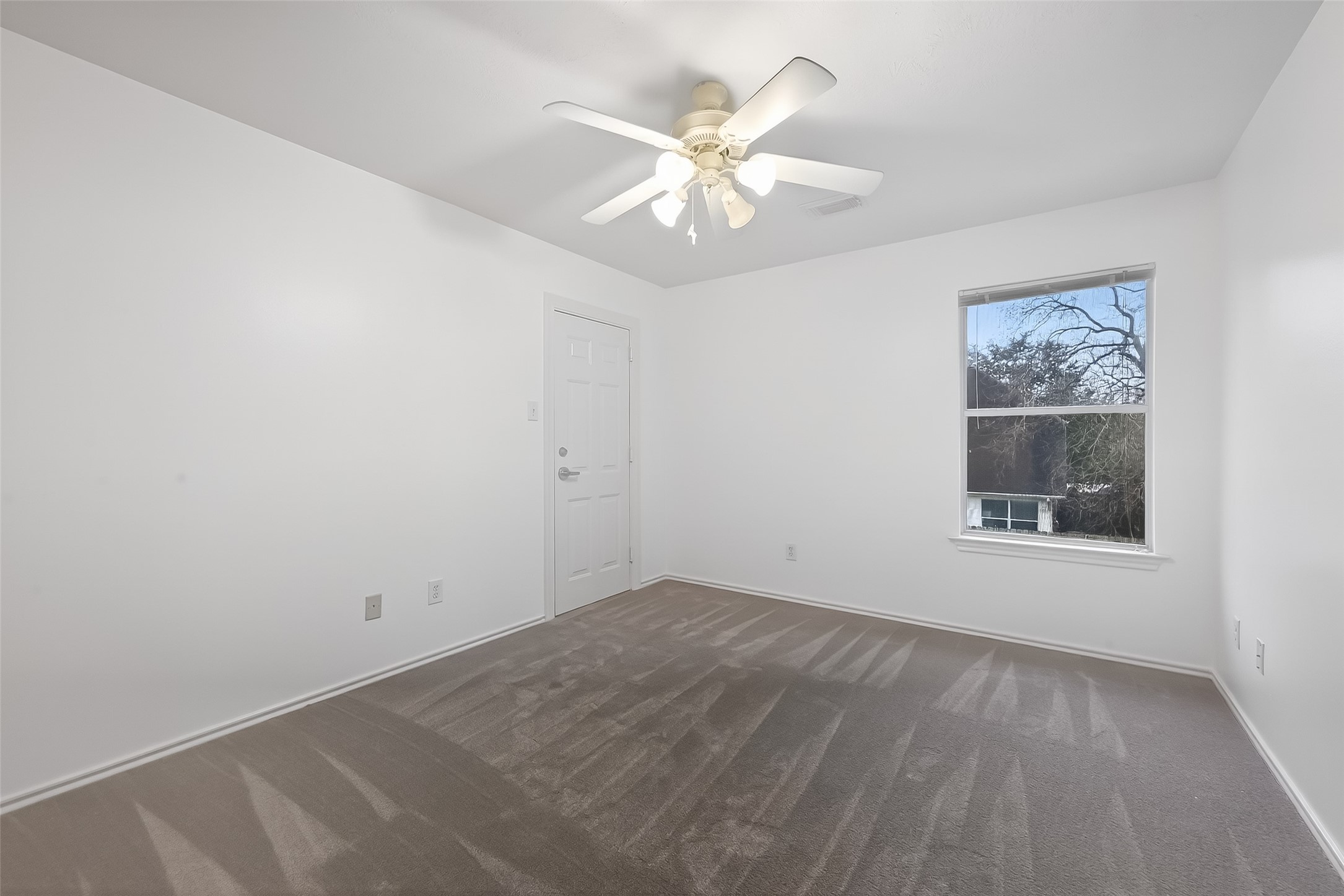 2423 Floral Ridge Drive Spring, TX 77388 - Photo 28 of 44 Secondary bedroom featuring a reinforced theft-proof walk-in closet, ideal for secure storage or valuables.