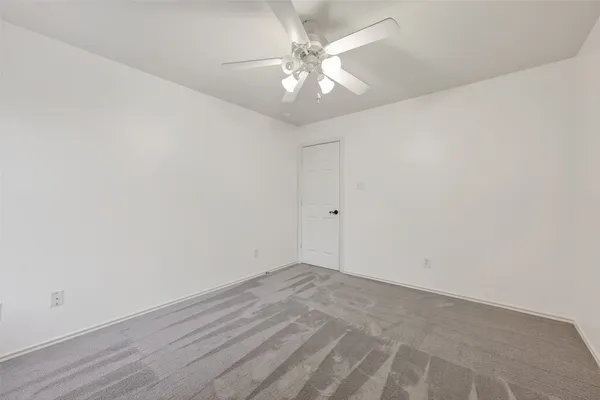 an aerial view of residential houses with city view