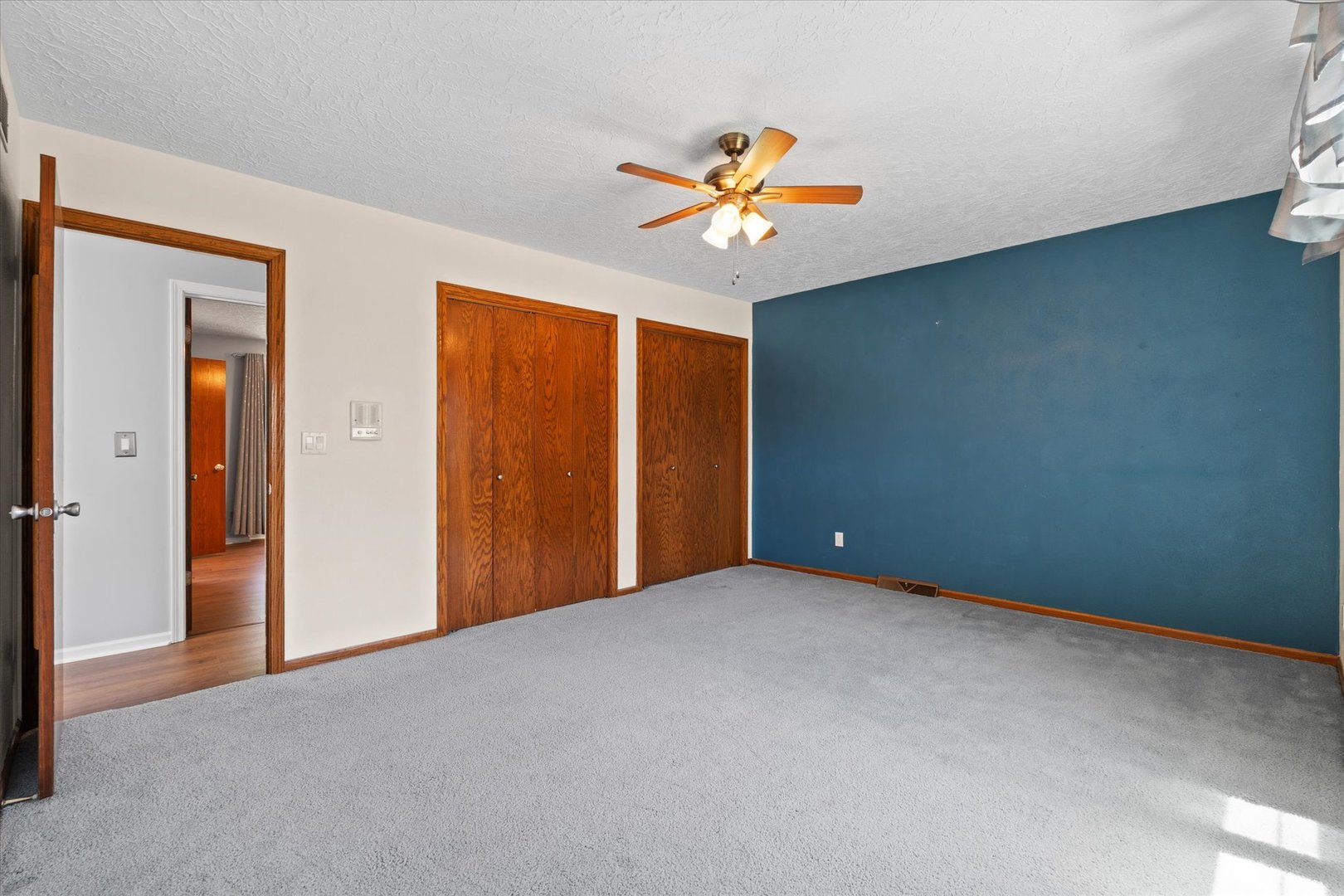 10 Oak Grove Road Geneseo, IL 61254 - Photo 20 of 43 a view of a livingroom with a ceiling fan