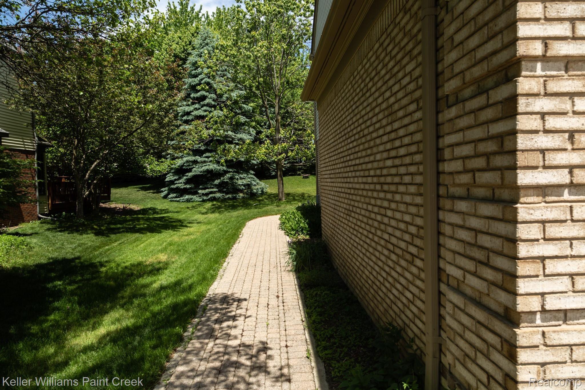 2452 Pleasant View Drive Rochester, MI 48306 - Photo 38 of 52 Herb garden along the west side of house!