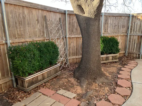 a view of a wooden fence