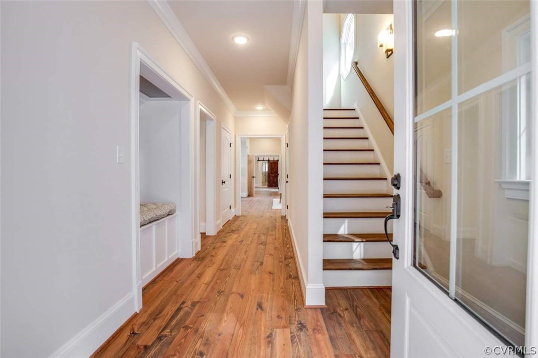 4120 East Old Gun Road Midlothian, VA 23113 - Photo 11 of 25 a view of a hallway with wooden floor and entryway
