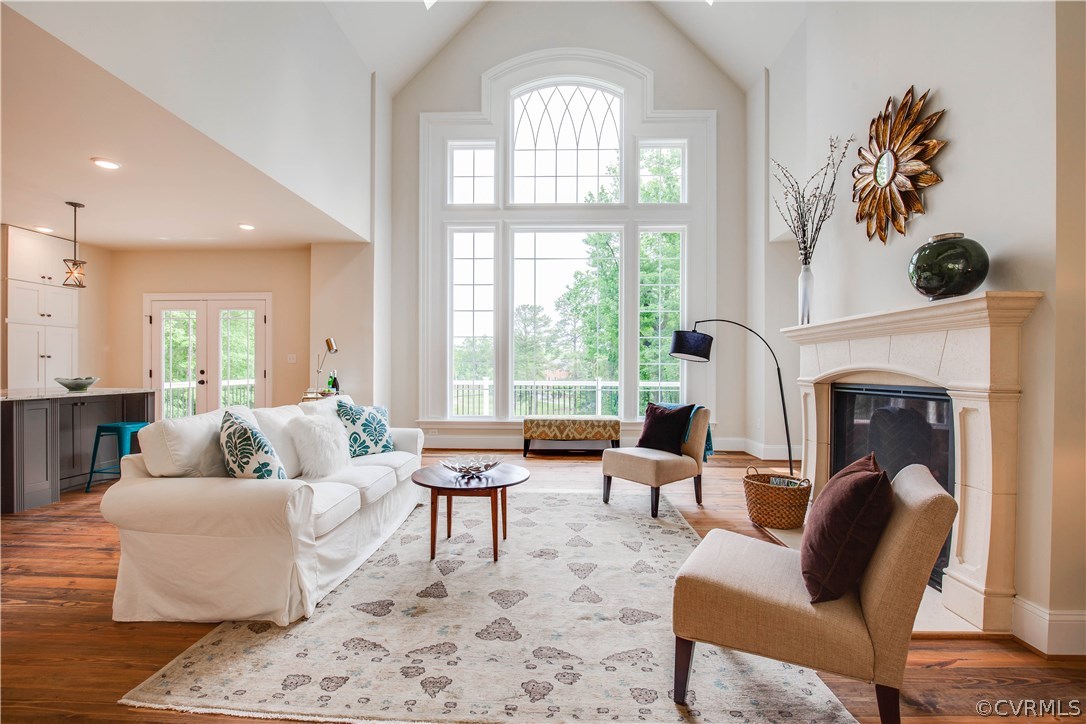 4120 East Old Gun Road Midlothian, VA 23113 - Photo 13 of 25 a living room with furniture fireplace and a large window