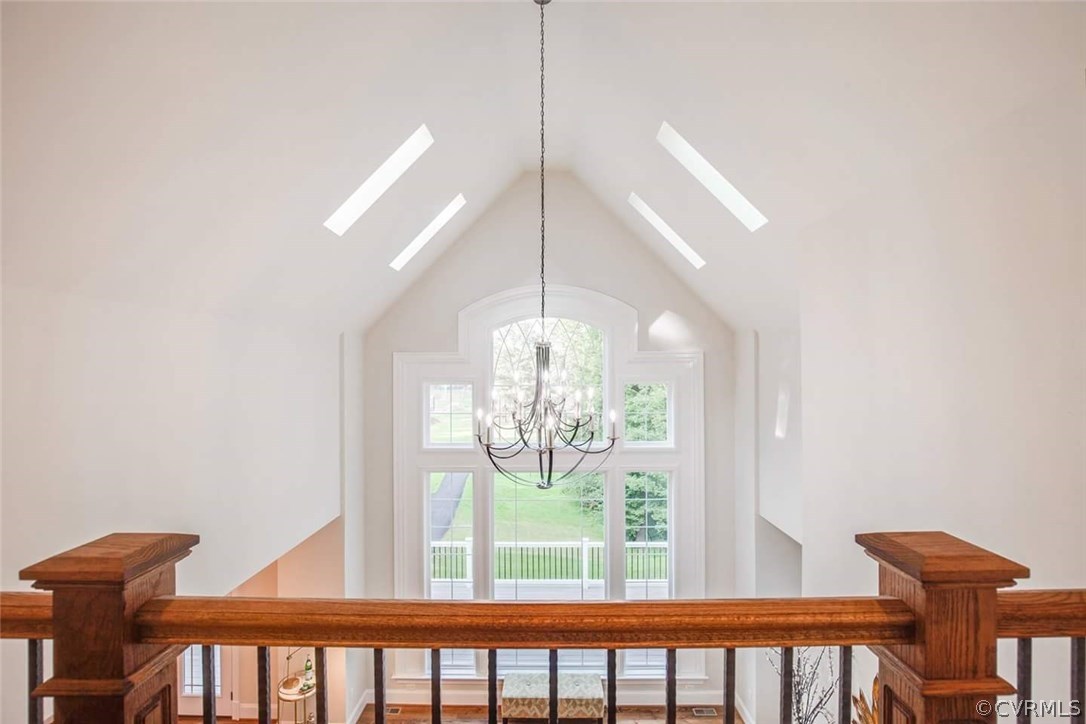 4120 East Old Gun Road Midlothian, VA 23113 - Photo 14 of 25 a view of a room with windows and chandelier