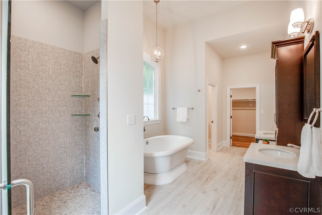 4120 East Old Gun Road Midlothian, VA 23113 - Photo 19 of 25 a bathroom with a granite countertop sink toilet and shower