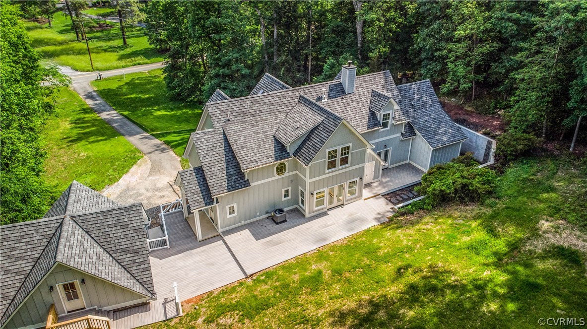 4120 East Old Gun Road Midlothian, VA 23113 - Photo 9 of 25 an aerial view of a house with swimming pool and garden
