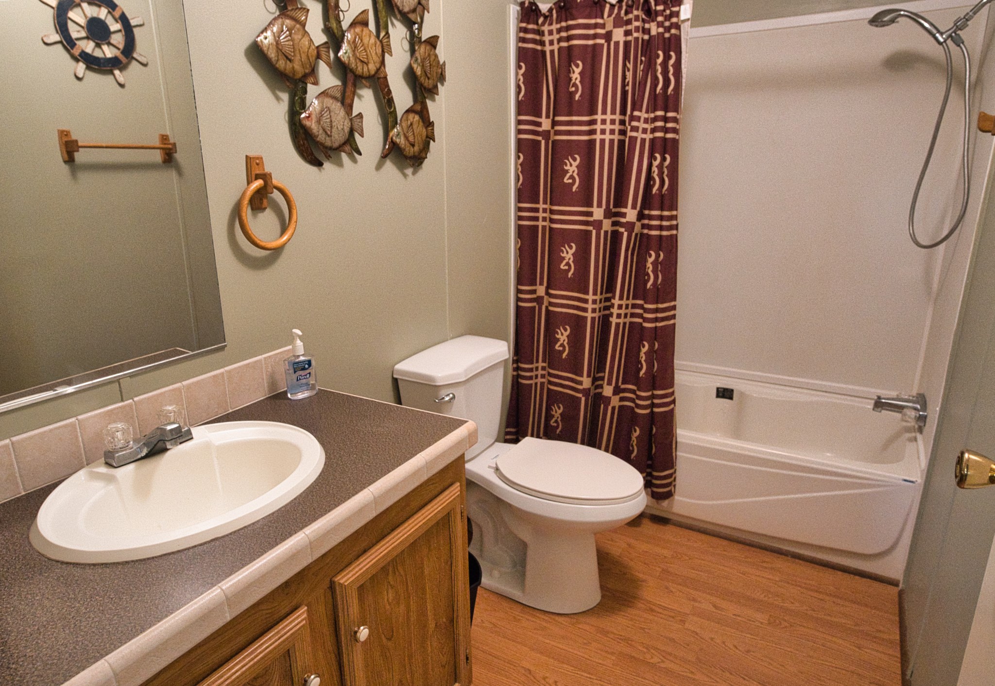 5582 County Road 469 Brazoria, TX 77422 - Photo 17 of 32 a bathroom with a sink toilet and shower