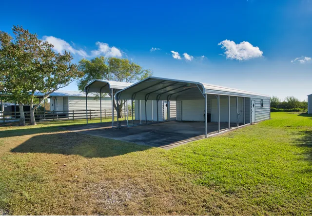 a front view of a house with yard