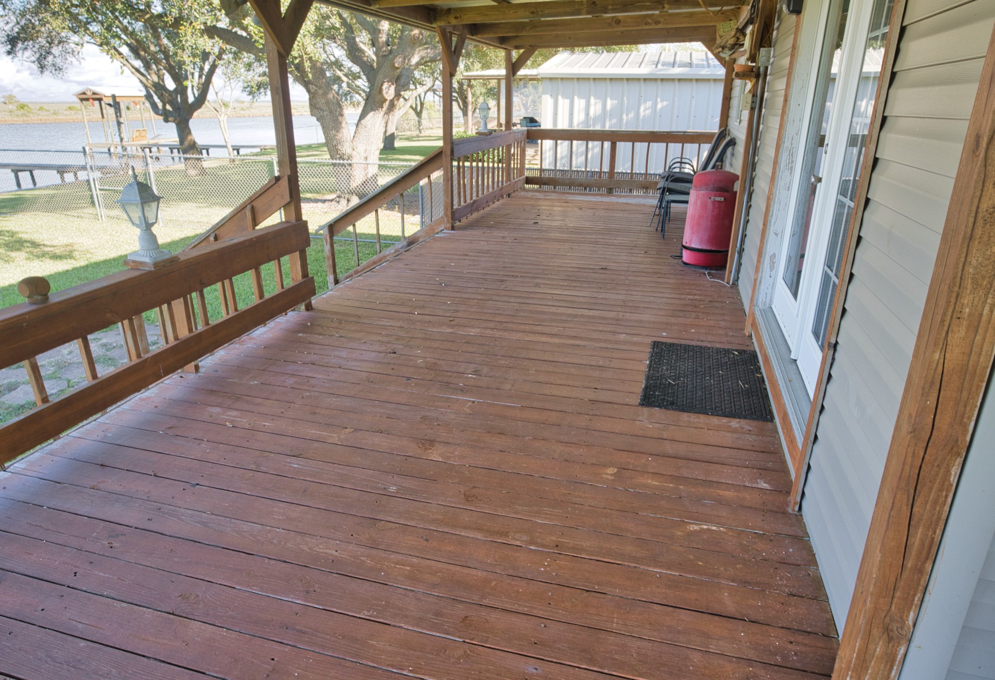 5582 County Road 469 Brazoria, TX 77422 - Photo 7 of 32 Covered Deck- double doors entry to the home