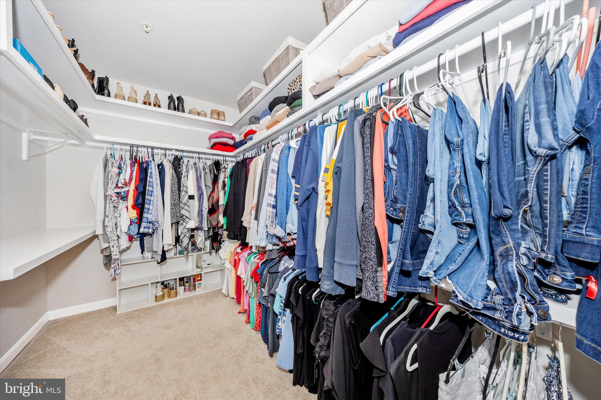 700 Bond Street Frederick, MD 21701 - Photo 23 of 49 a view of walk in closet with clothes