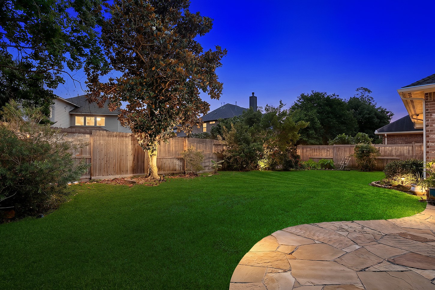 18722 Duke Lake Drive Spring, TX 77388 - Photo 21 of 26 a view of a backyard with a garden