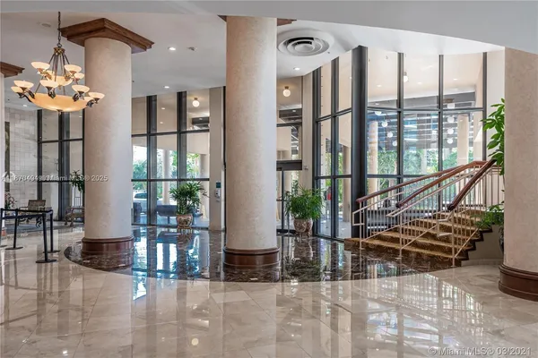 a view of balcony with furniture