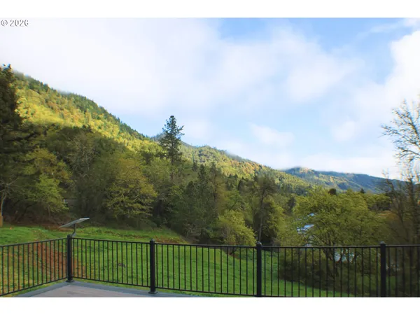 a view of outdoor space with deck and backyard