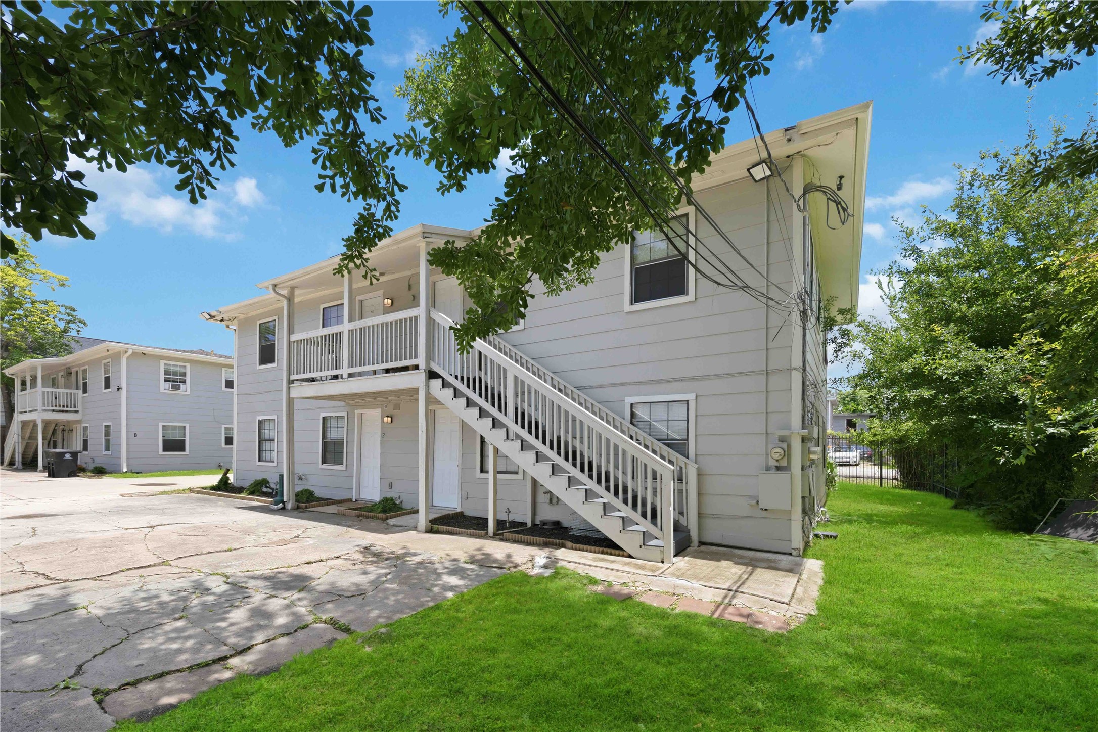 6726 Burkett Street Houston, TX 77021 - Photo 18 of 18 a view of a house with a yard