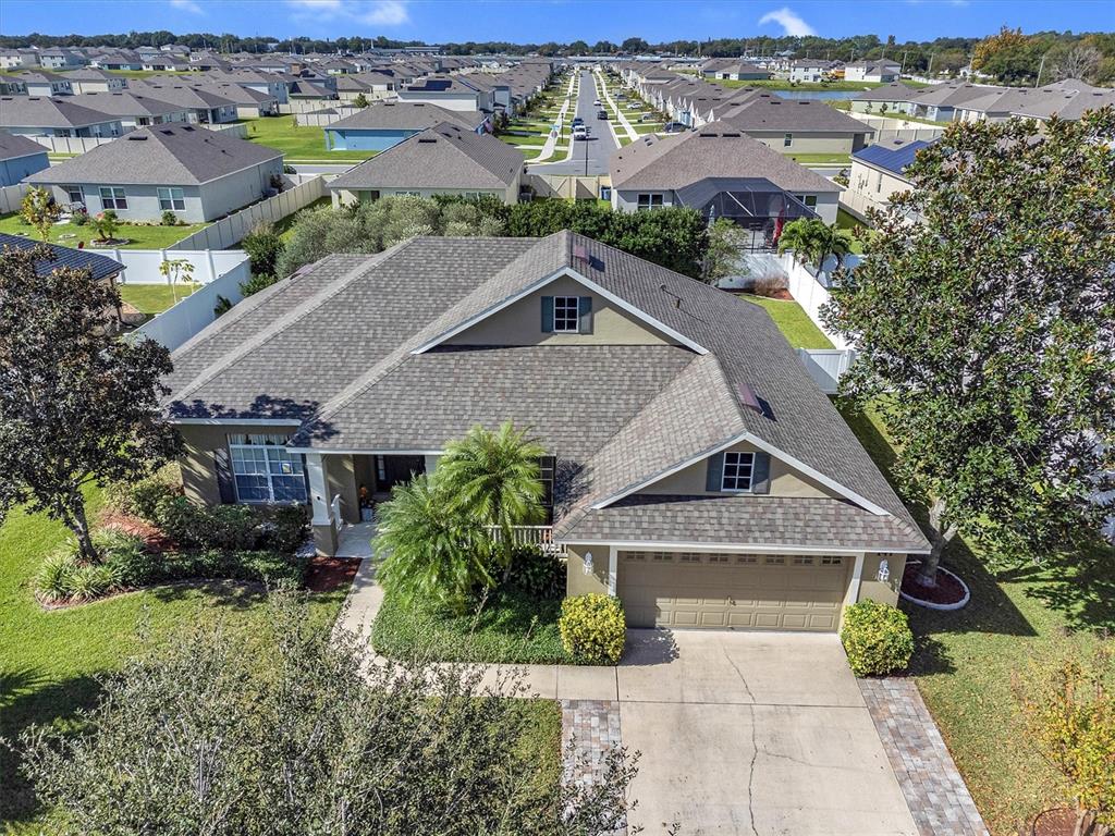 147 Costa Loop Auburndale, FL 33823 - Photo 1 of 1 an aerial view of multiple house
