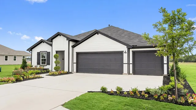 a living room with furniture floor to ceiling window and a flat screen tv