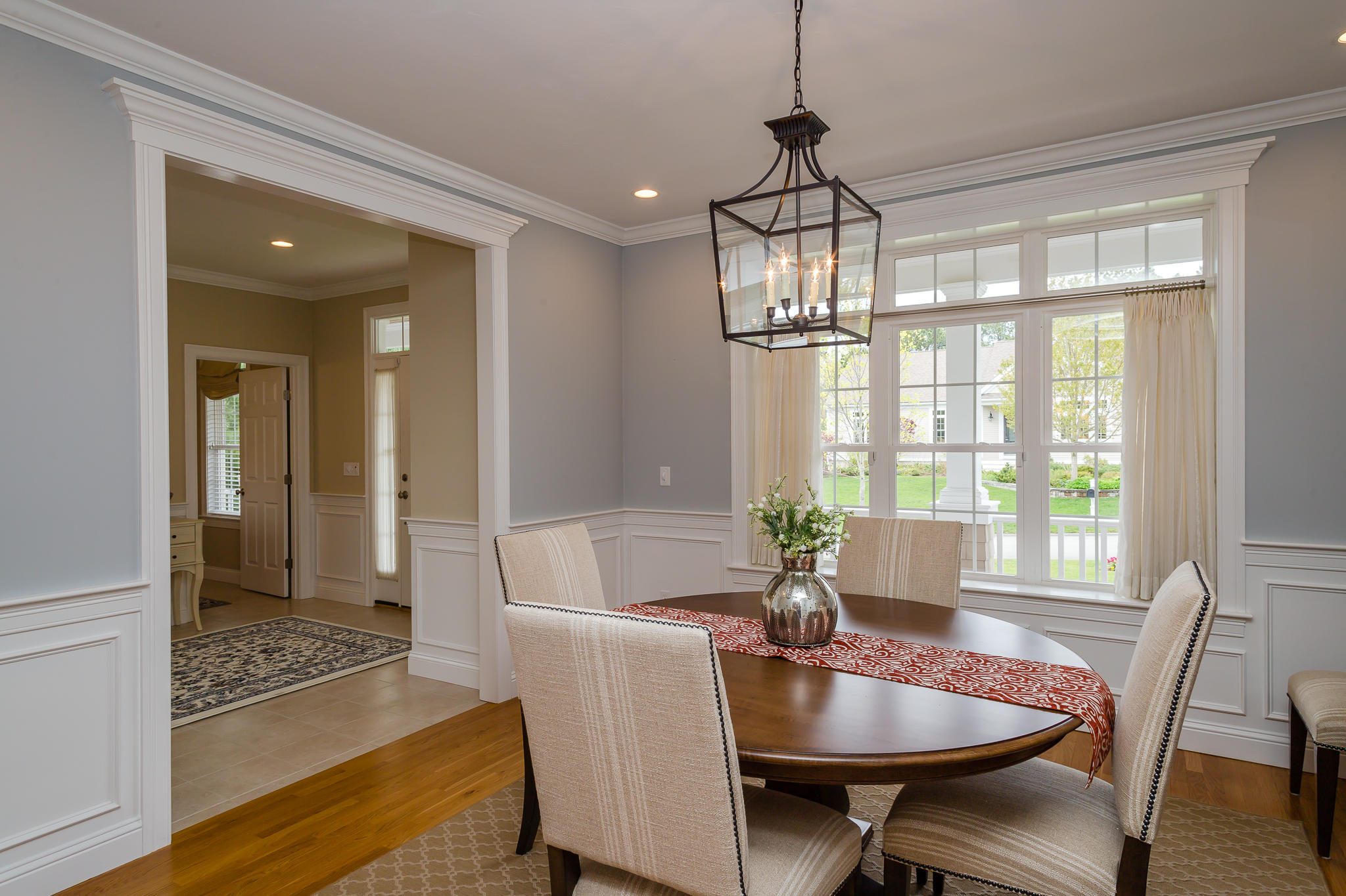 85 Palmer Road Mashpee, MA 02649 - Photo 11 of 38 a view of a dining room with furniture window and wooden floor