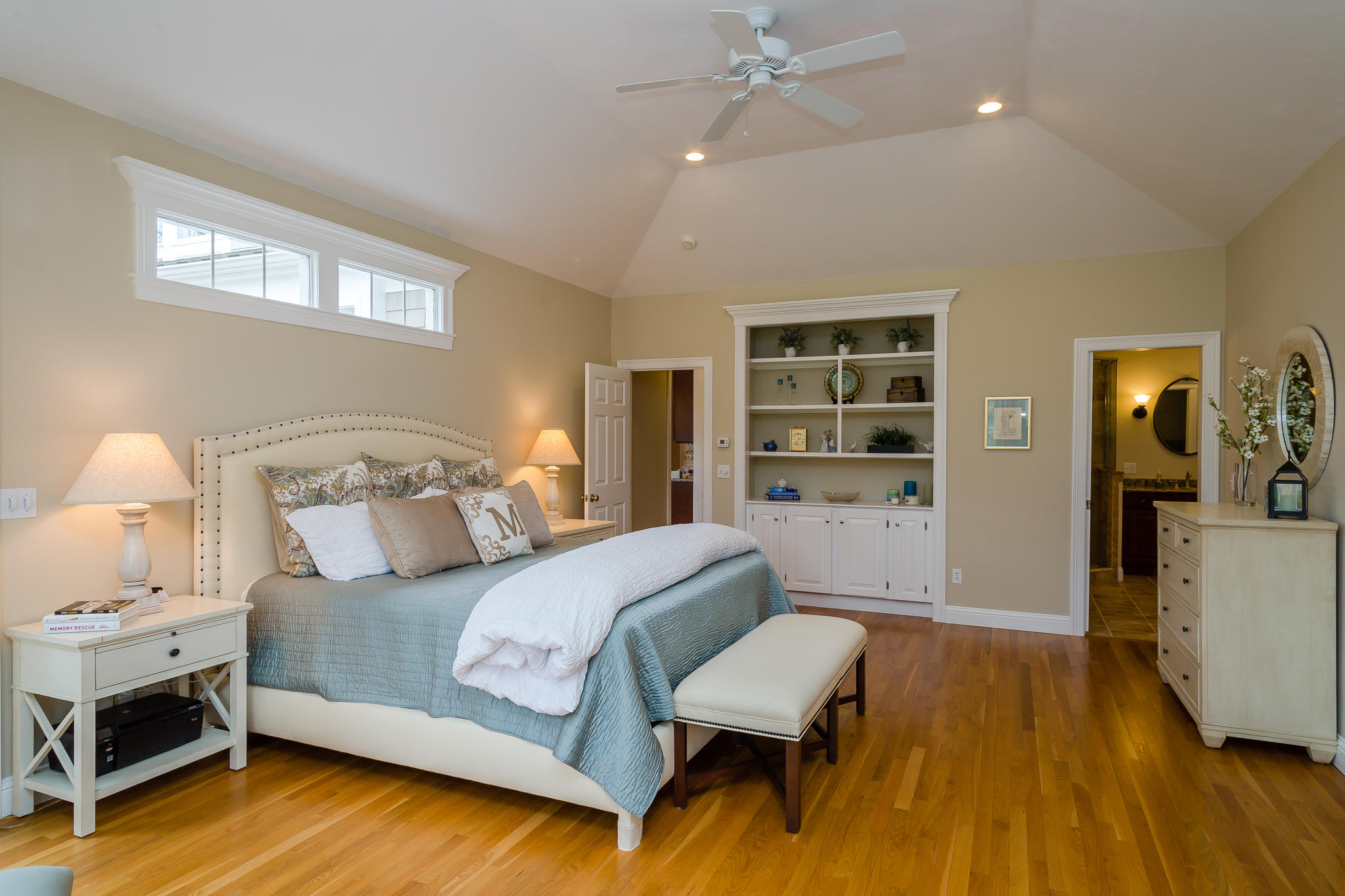 85 Palmer Road Mashpee, MA 02649 - Photo 13 of 38 a spacious bedroom with a bed and a wooden floor