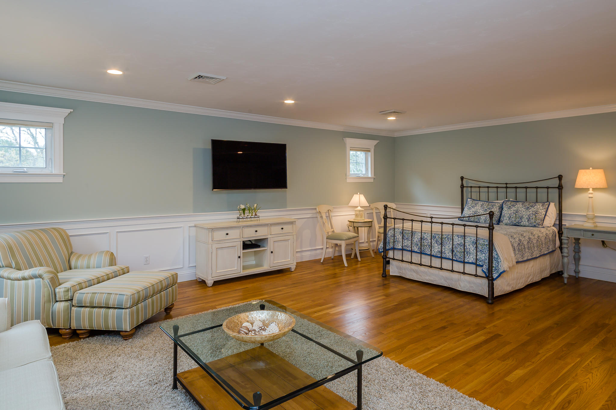 85 Palmer Road Mashpee, MA 02649 - Photo 19 of 38 a living room with furniture and a flat screen tv