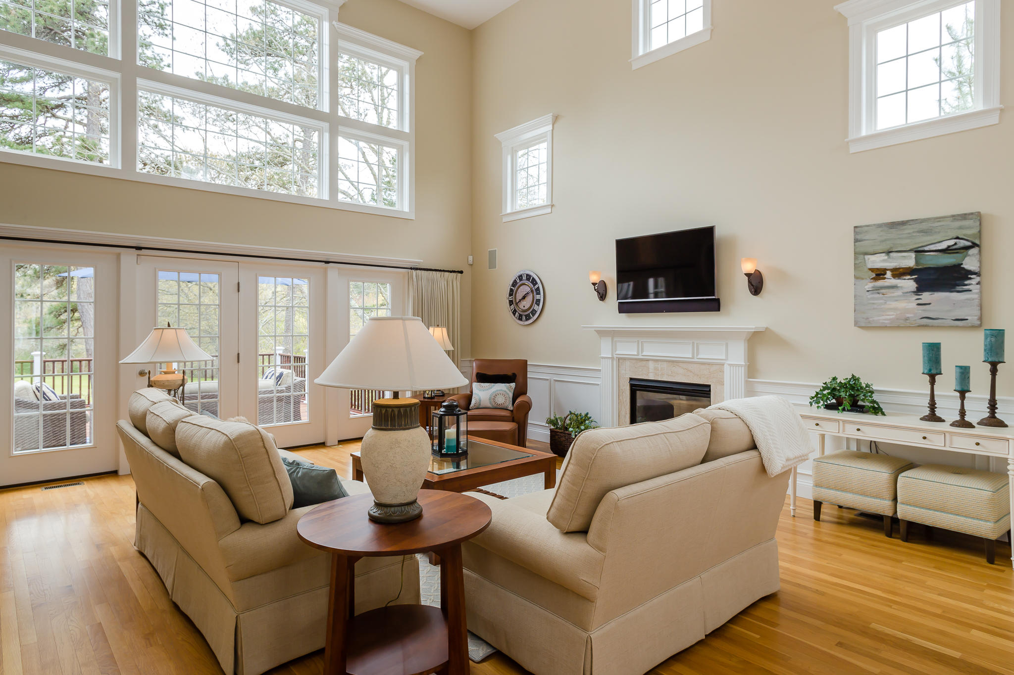 85 Palmer Road Mashpee, MA 02649 - Photo 2 of 38 a living room with fireplace furniture and a flat screen tv