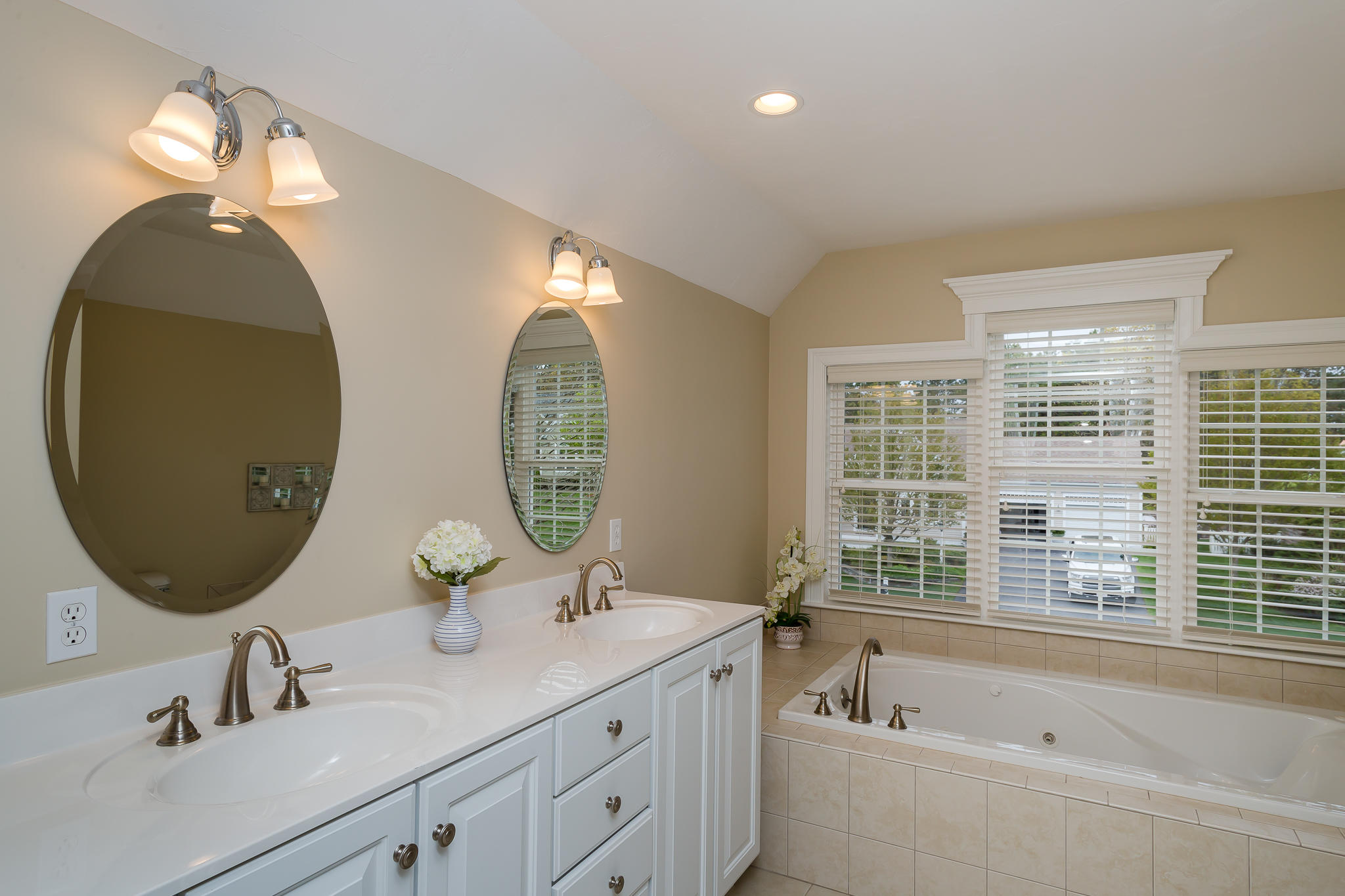 85 Palmer Road Mashpee, MA 02649 - Photo 22 of 38 a bathroom with a double vanity sink and a mirror
